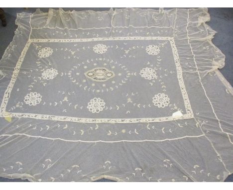 Twentieth century lace tablecloths comprising two large black lace tablecloths and a dark brown lace example together with tw