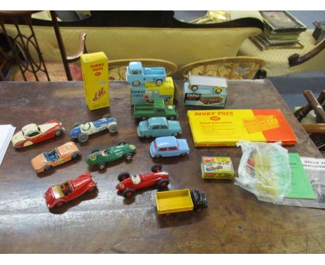 A collection of Dinky and Corgi cars to include a Corgi 409 Forward Control Jeep FC-150, in original box, 101 Platform Traile