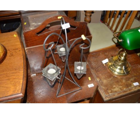 A three branch tea light holder