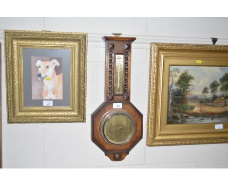 An oak cased barometer