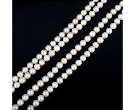 A Vintage double-strand pearl necklace, with textured 9ct clasp, necklace length 56cm, 77.5gA few pearls have small dimples a