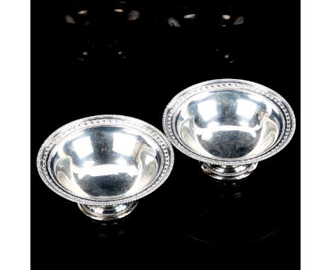 A pair of George V circular silver pedestal bon bon dishes, beaded edge, by Goldsmiths & Silversmiths Co Ltd, hallmarks Londo