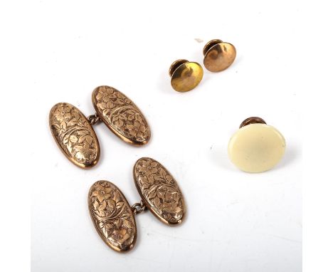 An early 20th century 9ct rose gold dress set, comprising pair of cufflinks, 2 studs and button, engraved floral decoration, 