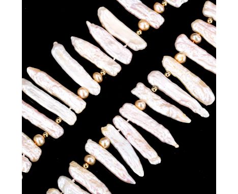 A modern pink Baroque pearl fringe necklace, on 9ct clasp, necklace length 40cm, 63.2gNo damage and repairs, clasp working, m