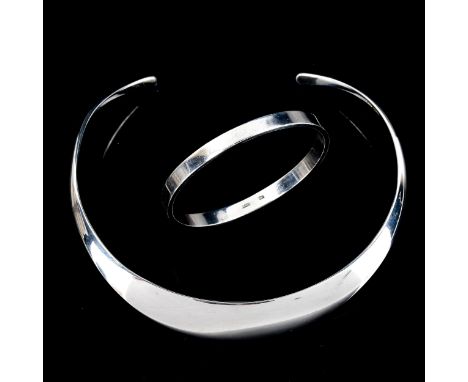 A Danish stylised sterling silver neck torque and similar sterling bangle, maker's include Horsens Solvvarre Fabrik and Poul 