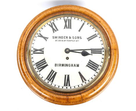 A light oak-cased 30-hour circular dial wall clock, by Swinden &amp; Sons of Birmingham, white enamel dial with Roman numeral
