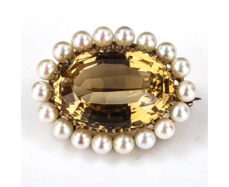 A mid-20th century Scottish 9ct gold Cairn Gorm and cultured pearl brooch, set with large oval-cut quartz with border of whol