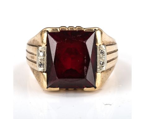 A large American 9ct gold rubellite and diamond signet ring, setting height 15.6mm, size S, 11.4gNo damage or repairs, all st