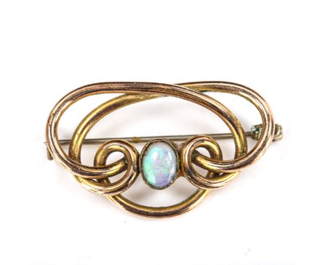 An Art Nouveau opal openwork brooch, unmarked yellow metal settings with oval cabochon white opal, brooch length 34.3mm, 4.9g