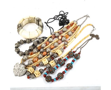 A quantity of Eastern and Tribal jewellery, including agate bone etcLot sold as seen unless specific item(s) requested 