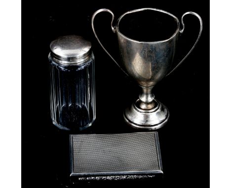 An Austro-Hungarian silver cigarette case, English silver trophy, and silver-topped glass toilet jar, 3.2oz weighable (3)Lot 