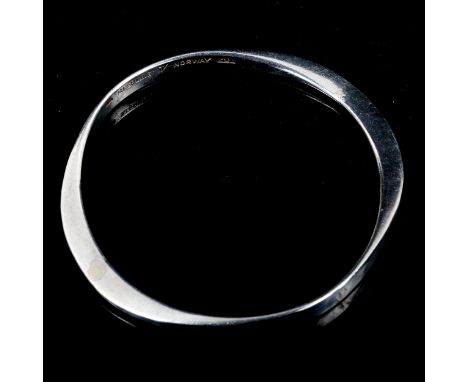 TONE VIGELAND - a Norwegian stylised sterling silver slave bangle, band width 5.7mm, internal diameter 6.5cm, 21.4gNo damage 