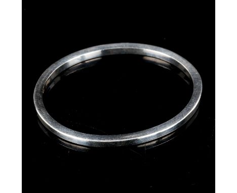 A Danish stylised sterling silver plain form bangle, possibly Edward Aagaard, band width 3.9mm, internal dimensions 6cm x 5.5