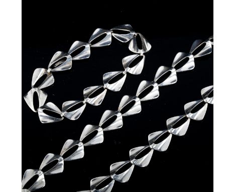 NIELS ERIK FROM - a Vintage Danish stylised sterling silver Delta Wing pattern matching necklace and bracelet set, lengths 42