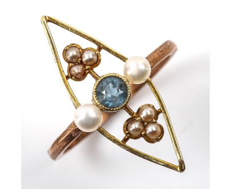 An Edwardian Art Nouveau blue topaz and pearl panel ring, openwork unmarked gold settings, setting height 25.3mm, size N, 2.4