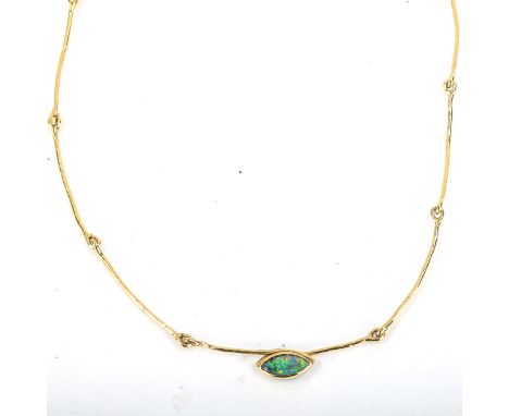 A modern silver-gilt Australian black opal necklace, opal length 13.6mm, necklace length 46cm, 12.1gNo damage or repair, opal