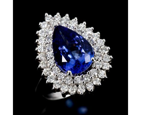 A large modern 18ct white gold tanzanite and diamond pear cluster ring, set with pear-cut tanzanite and modern round brillian