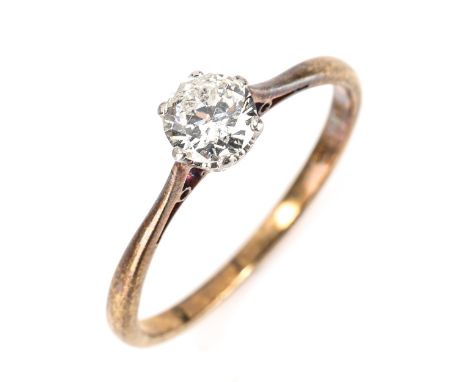 An 18ct gold 0.6ct solitaire diamond ring, platinum-topped 6-claw setting with modern round brilliant-cut diamond, diamond we