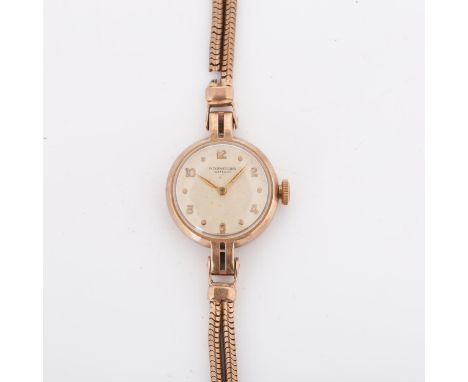 INTERNATIONAL WATCH CO (IWC) - a lady's Vintage 9ct gold mechanical wristwatch, ref. 77712, circa 1950s, silvered dial with g