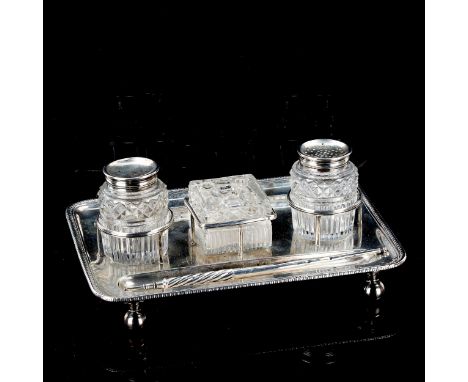 A George III silver desk inkstand, rectangular form with cut-glass inkwell, desk sander and 2 pen trays, with gadrooned rim, 