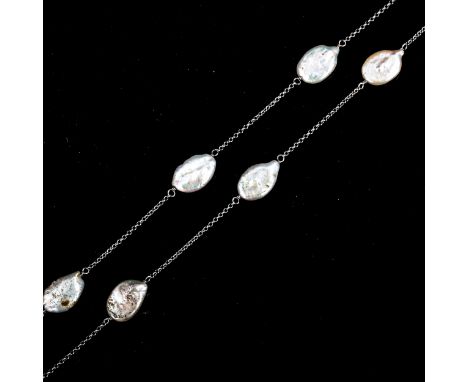 A modern silver and Baroque pearl spacer link necklace, length 90cm, 17.8gMost pearls are slightly dirty, no broken links, cl