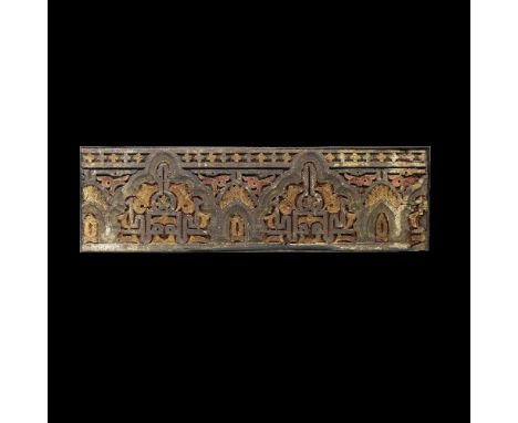 A Marinid painted wood calligraphic panel North Africa or Spain, 14th Centuryof rectangular form, carved with a series of cus