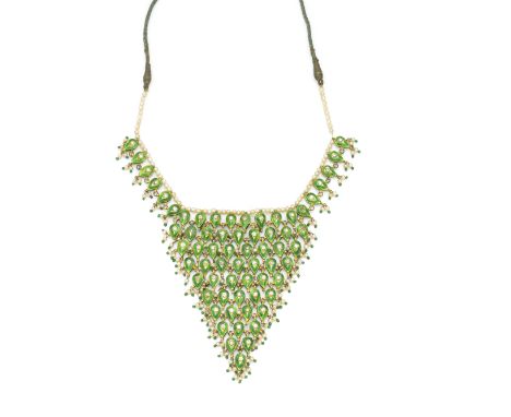 An enamelled gold necklace North India, 19th/ 20th Centurycomprising ten interconnected rows of teardrop elements each set wi