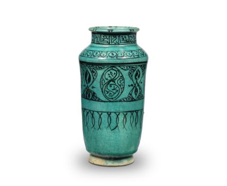 A Kashan underglaze-painted pottery albarello Persia, 12th/ 13th Centuryof slightly flaring conical form on a short foot, wit