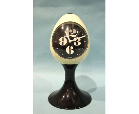 A late-60's/early-70's retro Estyma black and white plastic tulip-style alarm clock, 22.5cm high. 