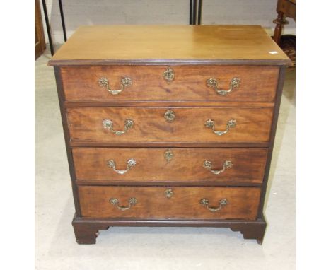 A George III gentleman's mahogany dressing chest, the rectangular top above four cockbeaded drawers, on bracket feet, the top