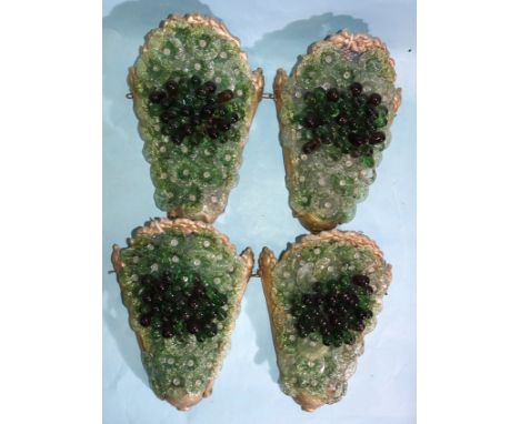 A set of four wall light shades of painted alloy applied with glass leaves and grapes, 26cm high, 22cm wide, (4). 