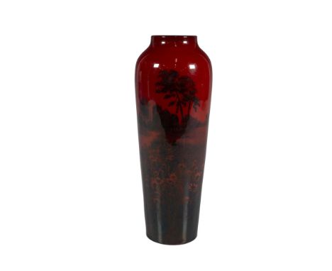 A deep ruby red vase featuring black artwork of a sunflower field nestled among the woods. Royal Doulton backstamp. Dimension