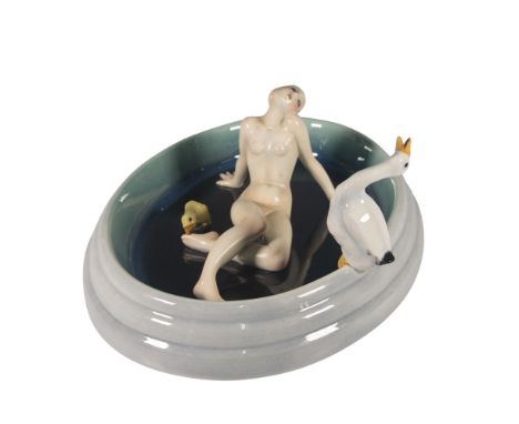 Dolce far niente, when translated is, Sweet doing nothing. A stunning glazed sculpture of a nude blonde hair beauty in an ova