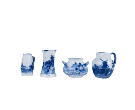 A set of four white and blue pieces that includes three pitchers and one double handled bowl, all painted with a scene of the