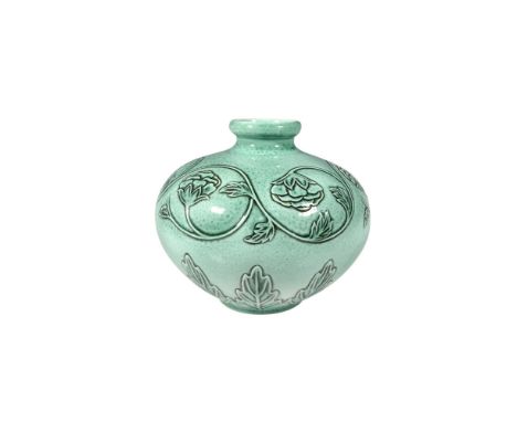 Hand made glossy vase featuring a lovey jade hue and decorated with a foliage pattern. Part of the Burslem Artwares collectio