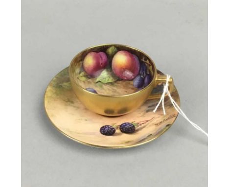 EARLY 20TH CENTURY ROYAL WORCESTER CUP AND SAUCER, painted with fruit by W.H. Austin, the saucer 10cm diamater