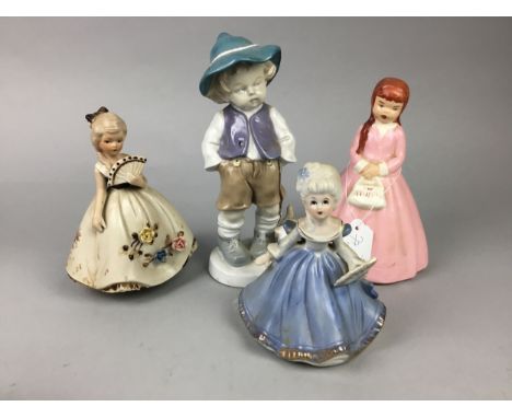 NAO FIGURE OF A GIRL, 24cm high, along with other ceramic figures including a figure group of two boys playing conkers, also 