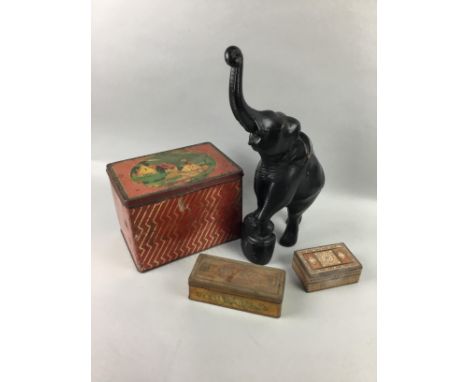CARVED FIGURE OF AN ELEPHANT, along with three vintage boxes, a gurgle jug, and vintage candlesticks