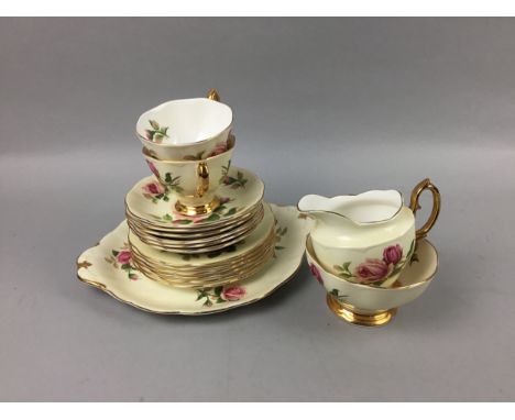 ROYAL ALBERT 'ENGLISH BEAUTY' PART TEA SERVICE, comprising 5 cups, six saucers, six sideplates, cream, sugar and sandwich pla