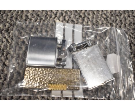 Three mid century lighters, two monogrammed; R.D.B and E.M.S including Parker Beacon,Ronson and the cosmic lighter.