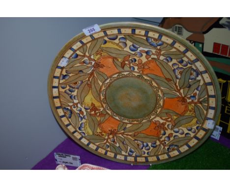 A large hand decorated ceramic charger plate by Charlotte Rhead for Bursley Ware.
41cm diameter, no damages or repairs.
