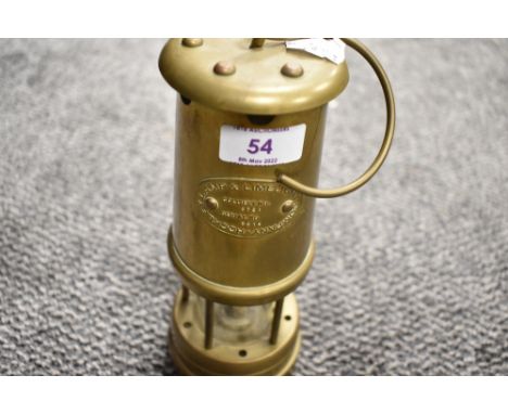 A Brass Lamp &amp; Limelight Company (Hockley) miner lamp, colliery No 8721, serial number 5614, 23cm