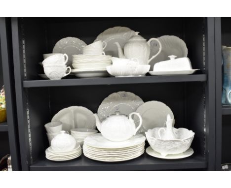 A part Coalport 'Countryware' dinner service comprising teapots, plates,butter dish, servers etc.
10 large plates, 8 tea cups