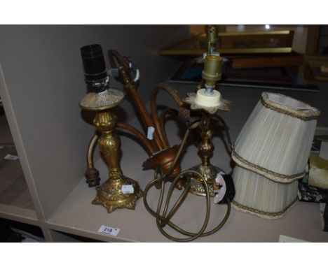 A trio of vintage table lights and a ceiling light.