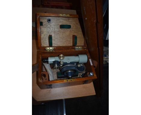 A 20th century surveyors theodolite by Stanley London 63420 with original wooden tripod stand