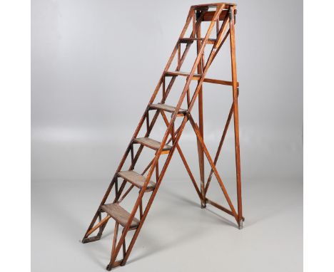 A JONES'S PATENT PITCH PINE FOLDING STEP LADDER. early 20th century, with six rungs, stamped Jones's Patent, numbered and dat