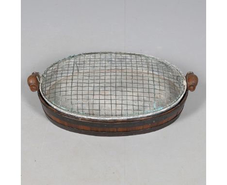 A GEORGE III WALNUT BRASS COOPERED TRAY/PLANTER. with scroll handles, later tin liner and flower grille, length 55cm inc. han