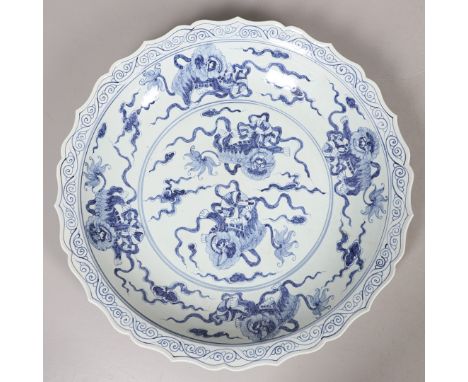 LARGE CHINESE BLUE &amp; WHITE DISH. A large 20thc copy of a Ming Dynasty dish, of unusually large size and painted with budd