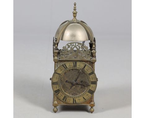 A LATE 19TH CENTURY BRASS LANTERN CLOCK BY CAMERER KUSS &amp; CO. of large proportions, rectangular engraved dial decorated w