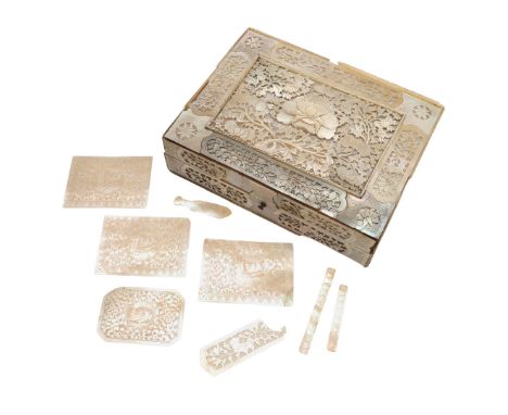 CHINESE MOTHER OF PEARL BOX &amp; COUNTERS. An elaborate mother of pearl box, with flowers and leaves in relief and pierced p